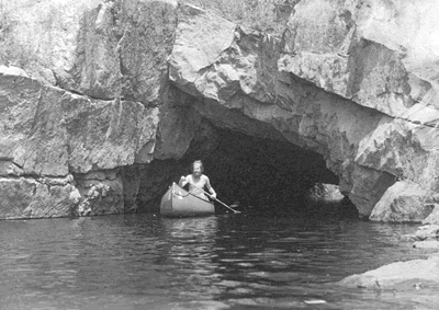 Canoeist passing through tunnel under the CNR main line